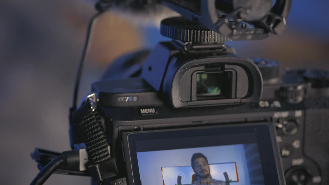 Free Stock Video Vlogger Recording With His Camera Live Wallpaper