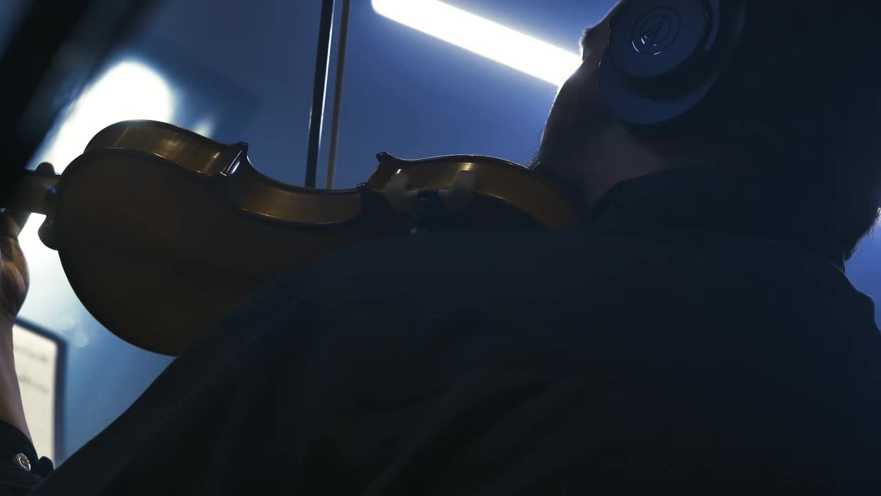Free Stock Video Violinist Playing With Sheet Music In A Recording Studio Live Wallpaper