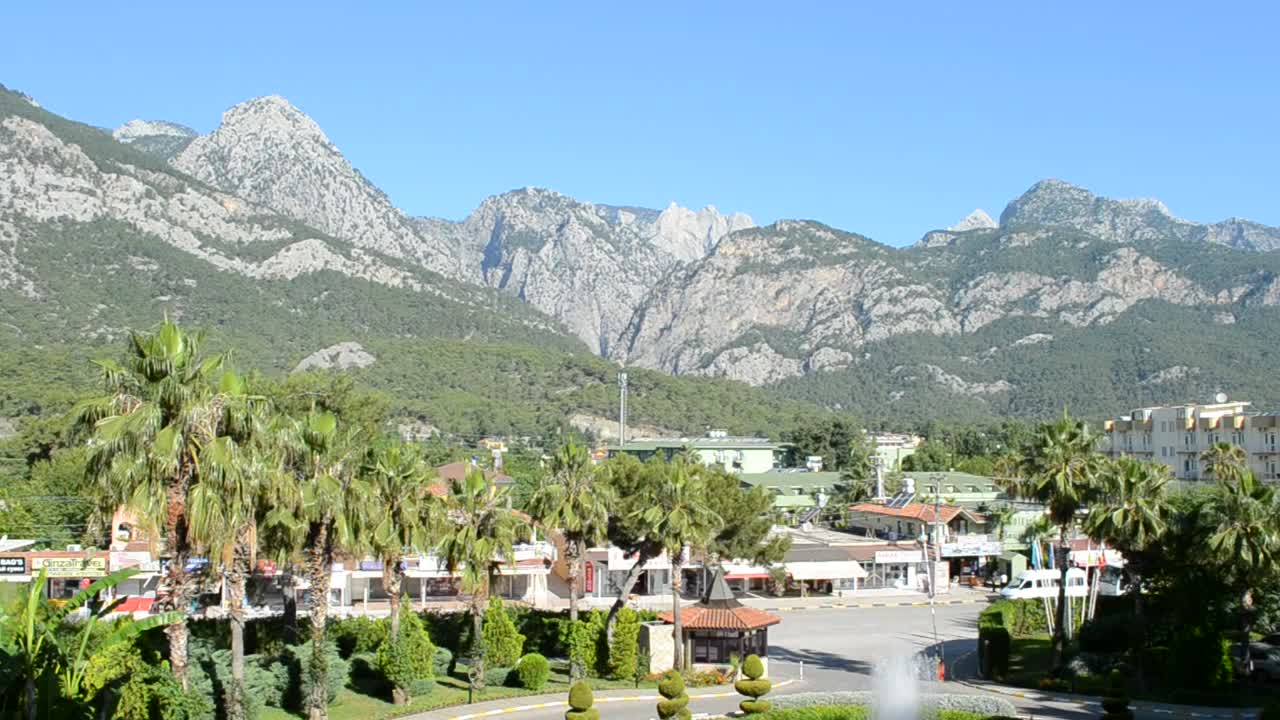 Free Stock Video Village Fountain At The Base Of A Mountain Live Wallpaper
