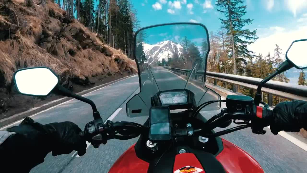Free Stock Video View Of A Motorcycle Driving In The Mountains Live Wallpaper