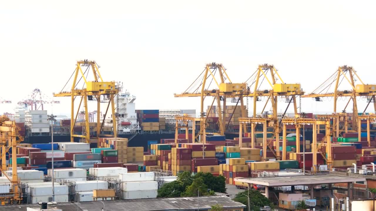 Free Stock Video Unloading A Cargo Ship In The Container Port Live Wallpaper