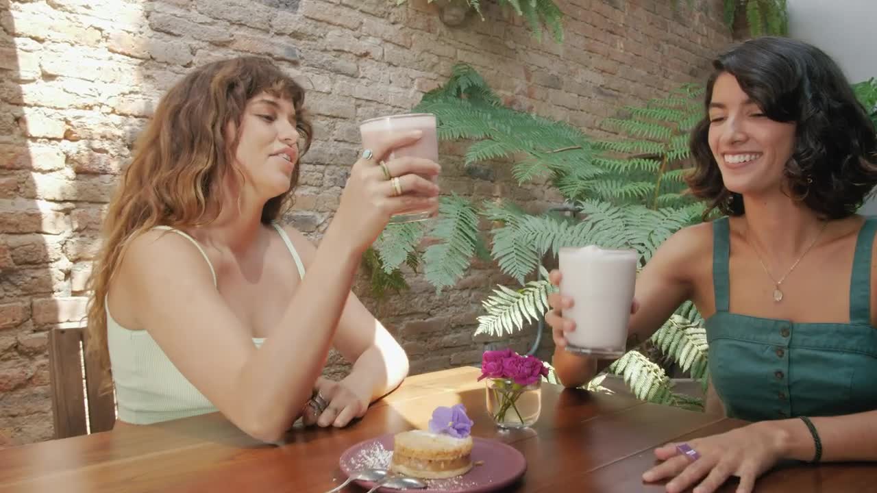 Free Stock Video Two Young Female Friends Laughing In A Coffee Shop Live Wallpaper