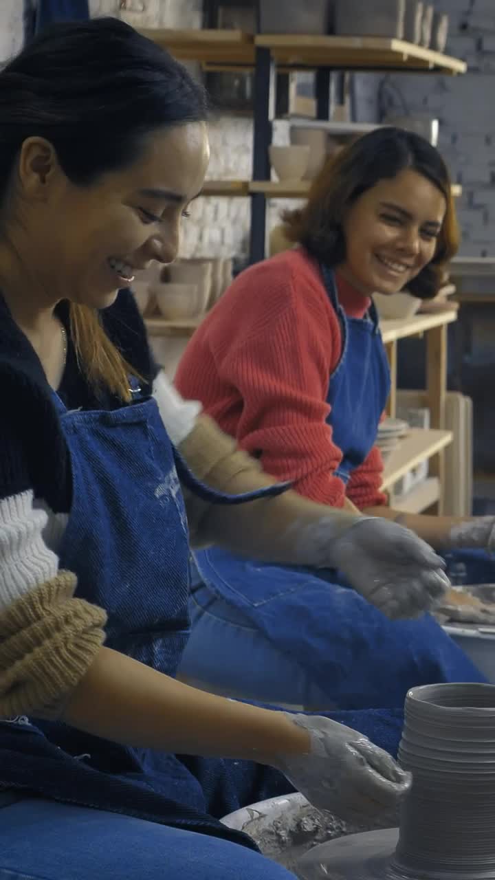 Free Stock Video Two Women Making Earthenware Vases Side By Side Live Wallpaper
