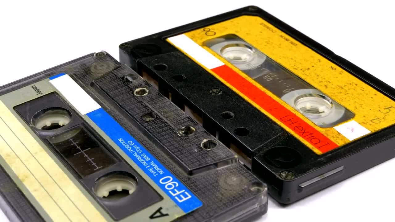 Free Stock Video Two Vintage Audio Cassettes Rotating Live Wallpaper