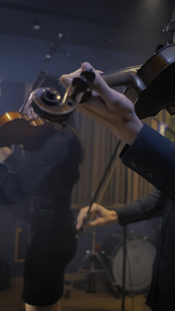 Free Stock Video Two Talented Violinists Playing In A Recording Studio Live Wallpaper