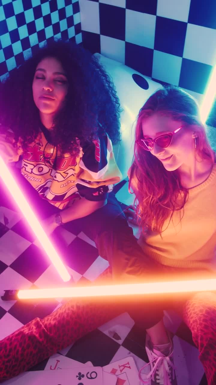 Free Stock Video Two Stylish Girls Surrounded By Bars Of Light Live Wallpaper