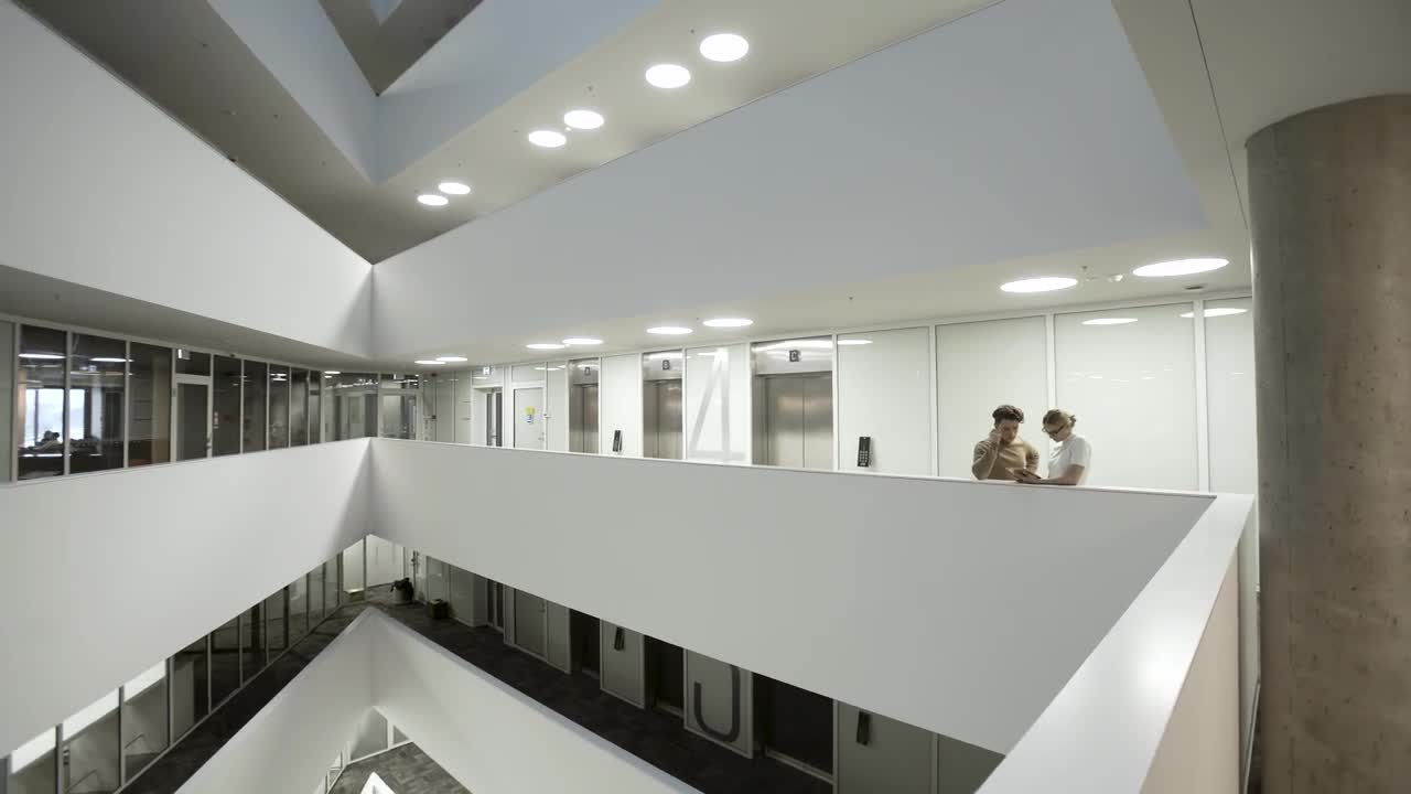 Free Stock Video Two People Talking Inside A Building Live Wallpaper