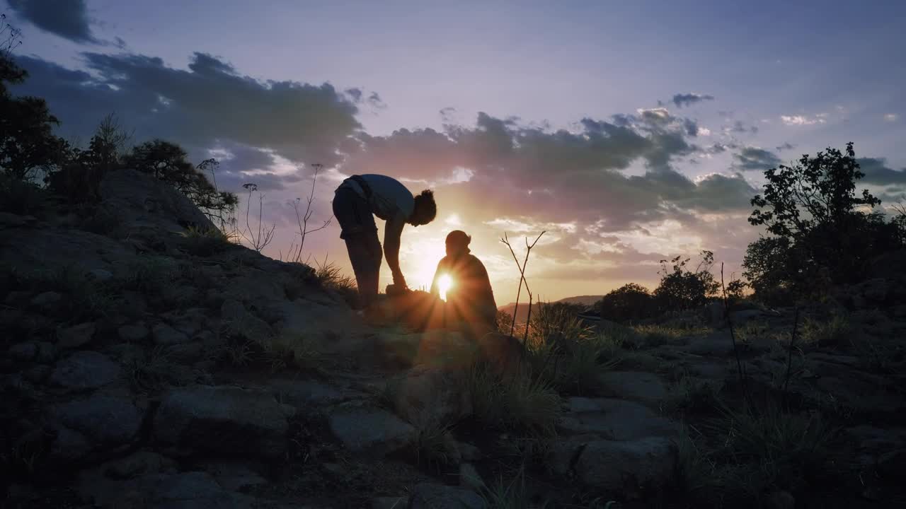 Free Stock Video Two Mountaineers Putting Away Their Things During The Sunset Live Wallpaper
