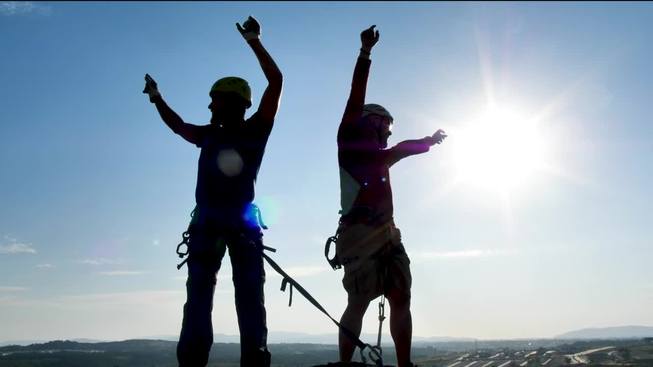 Free Stock Video Two Mountaineers Celebrating At The Top Live Wallpaper
