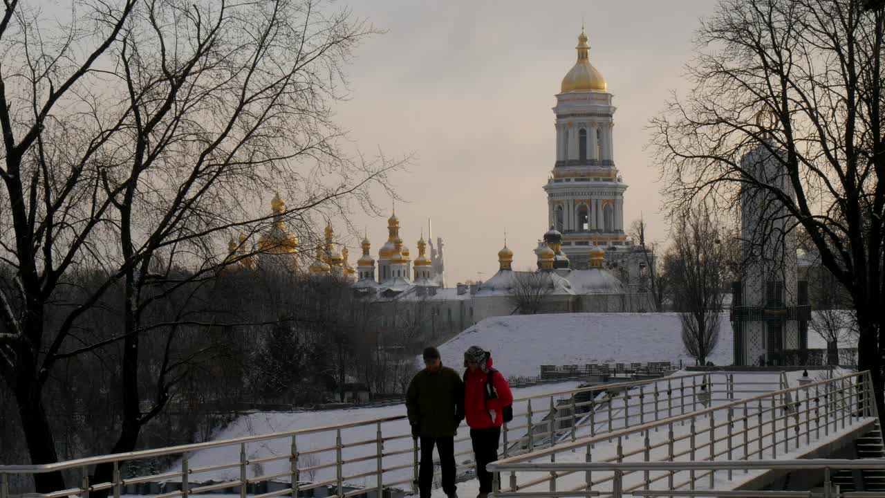 Free Stock Video Two Men Walking Through A City Under The Snow Live Wallpaper