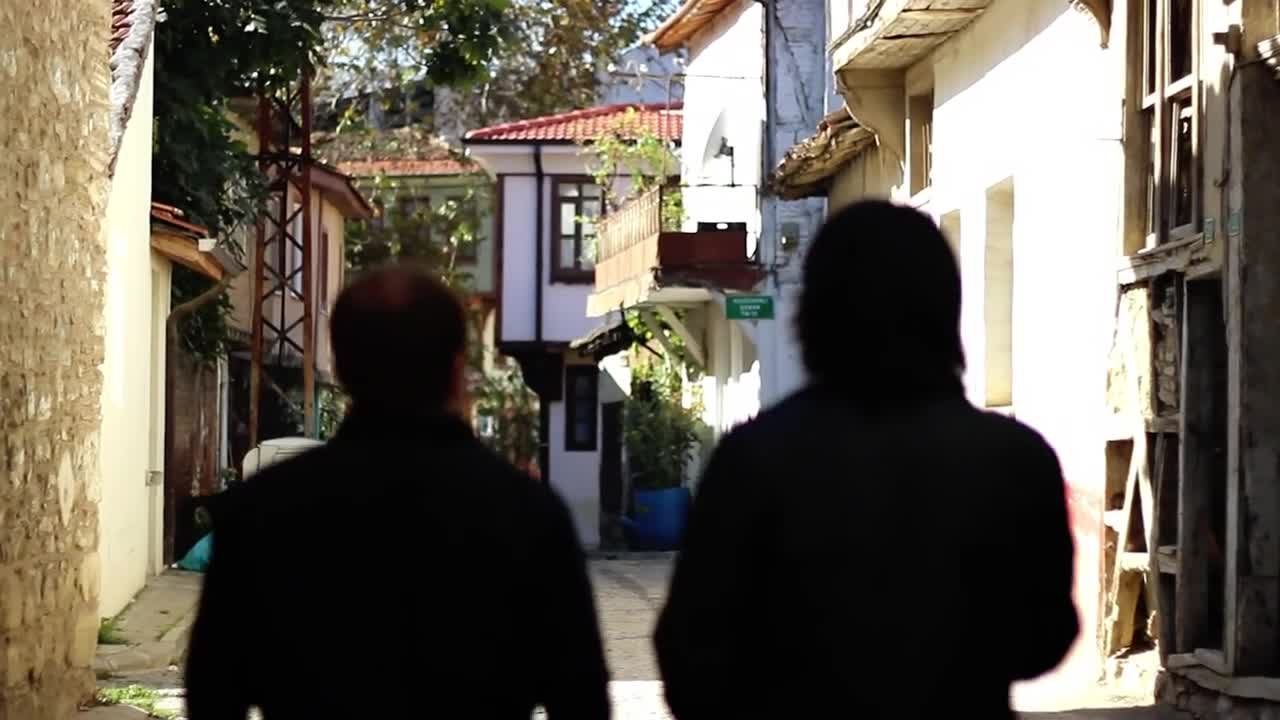 Free Stock Video Two Men Walking Along The Old Alleys Live Wallpaper