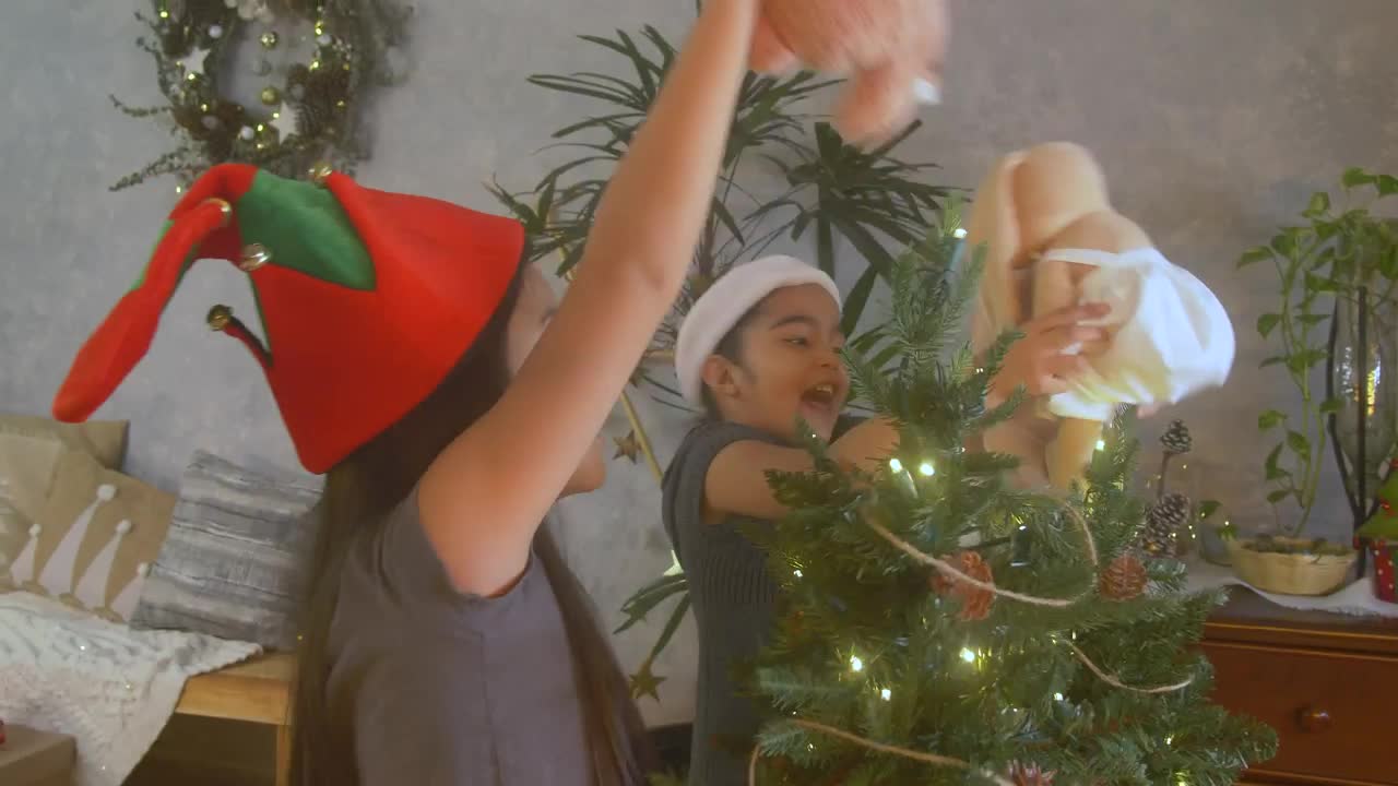 Free Stock Video Two Little Girls Playing With Their Christmas Presents Live Wallpaper