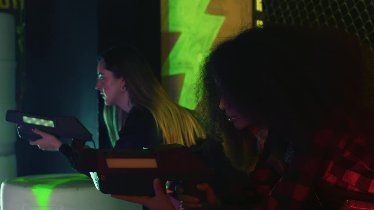 Free Stock Video Two Girls Immersed Playing Laser Tag Live Wallpaper