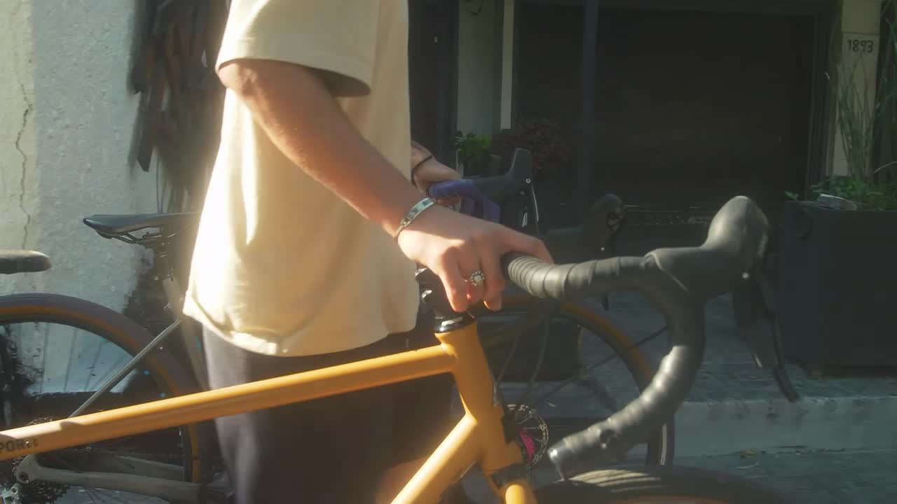 Free Stock Video Two Cyclists Walking Down The Street Live Wallpaper