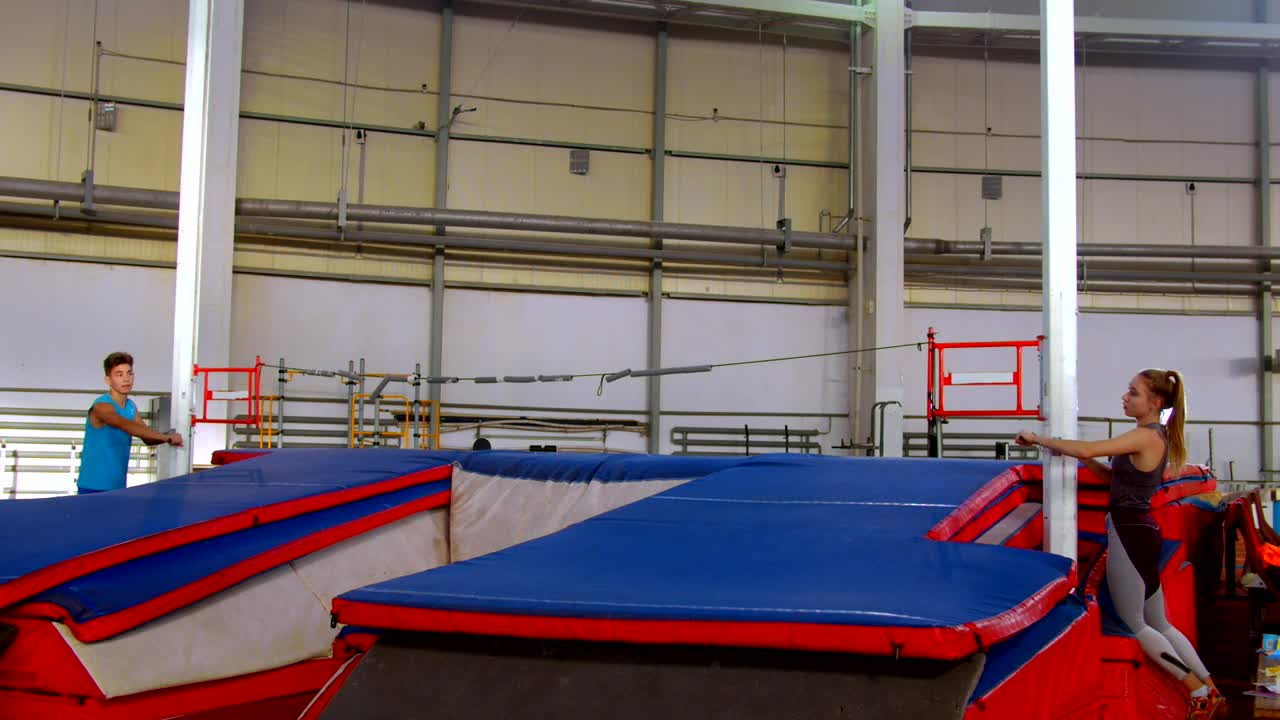Free Stock Video Two Athletes Placing Pole Vault Rope Live Wallpaper
