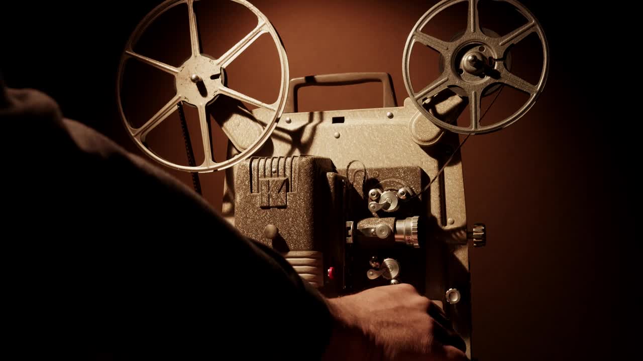 Free Stock Video Turning On A Vintage Film Projector Live Wallpaper
