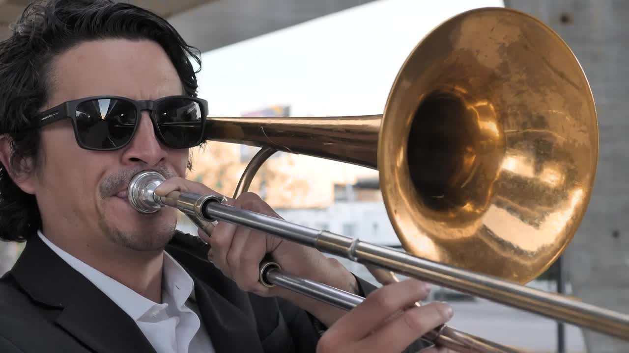 Free Stock Video Trombonist Musician Playing His Instrument Live Wallpaper