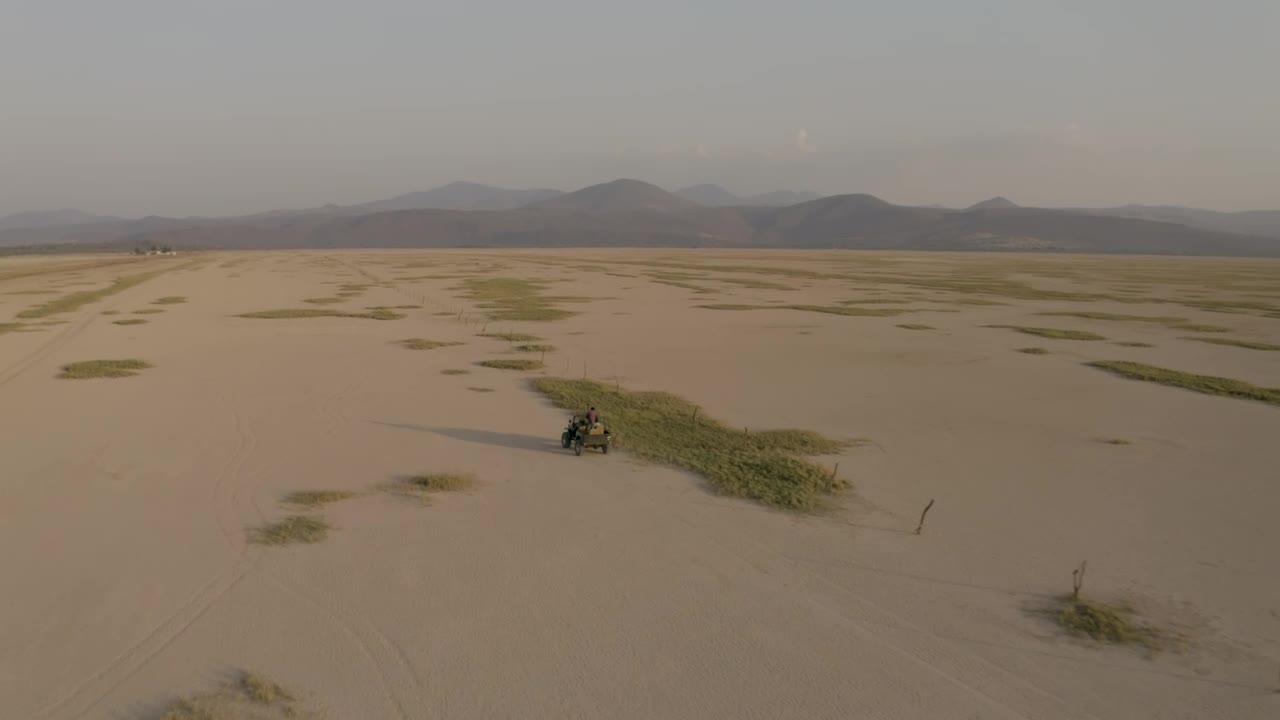 Free Stock Video Traveling Through An Arid Desert Surrounded By Mountains Live Wallpaper