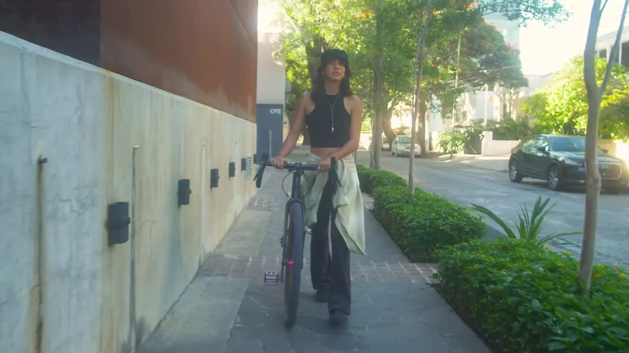 Free Stock Video Young Woman Walking With Her Bicycle Live Wallpaper