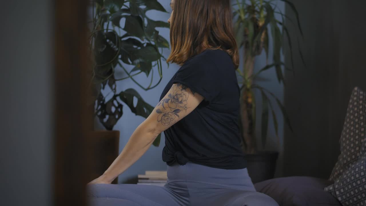 Free Stock Video Young Woman Stretching Her Body Sitting On The Floor At Live Wallpaper