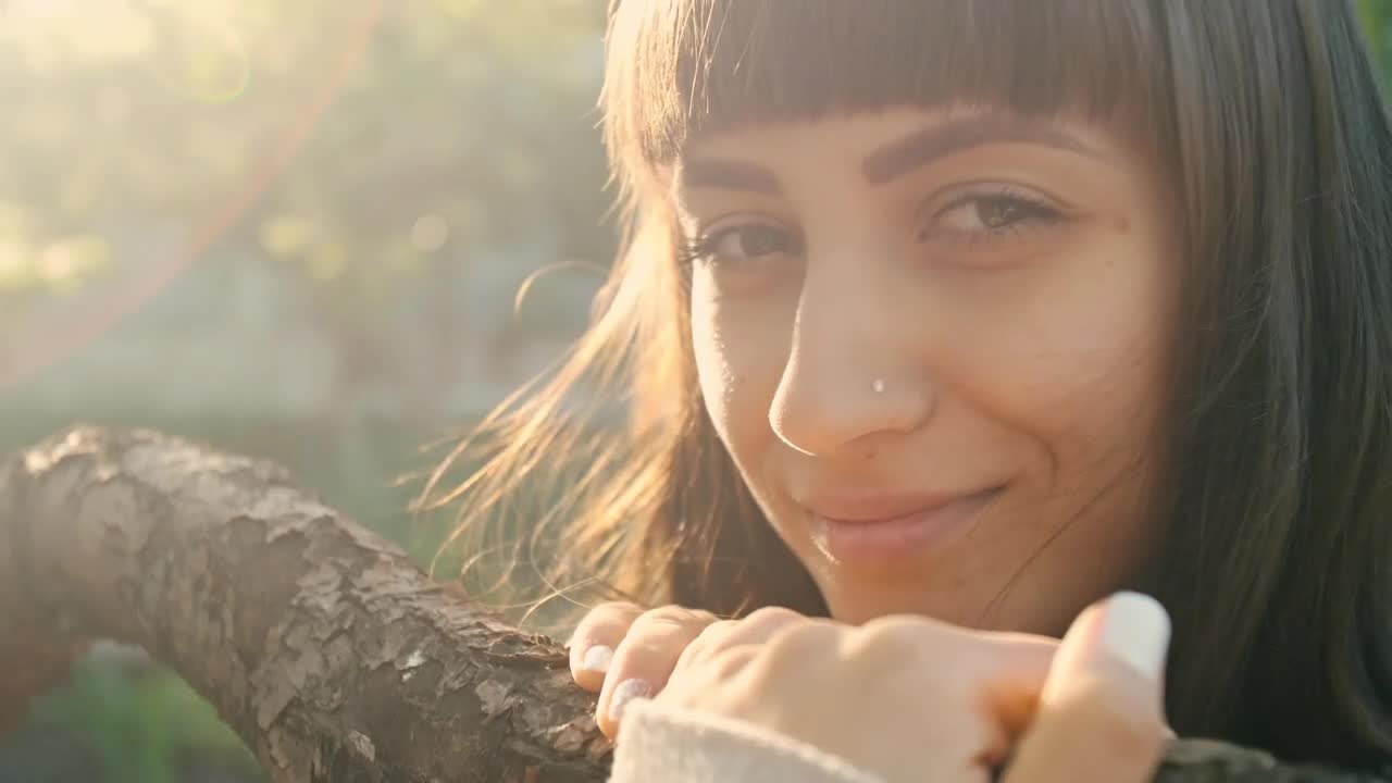 Free Stock Video Young Woman Smiling Next To A Branch Live Wallpaper