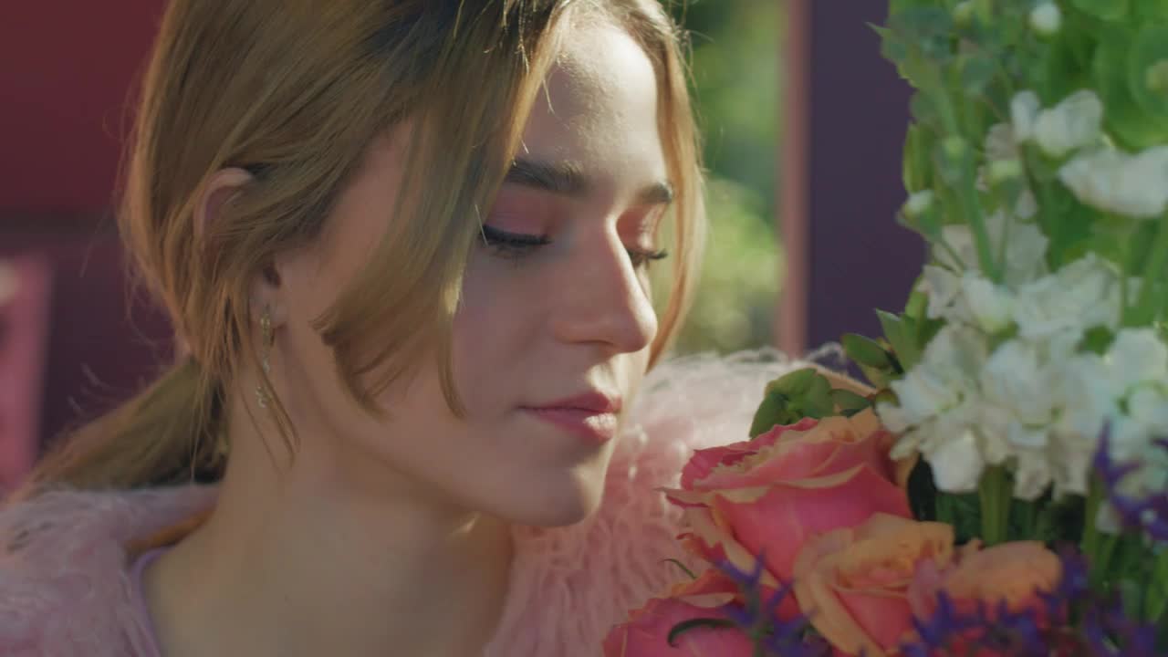 Free Stock Video Young Woman Smells Her Flower Bouquet Live Wallpaper