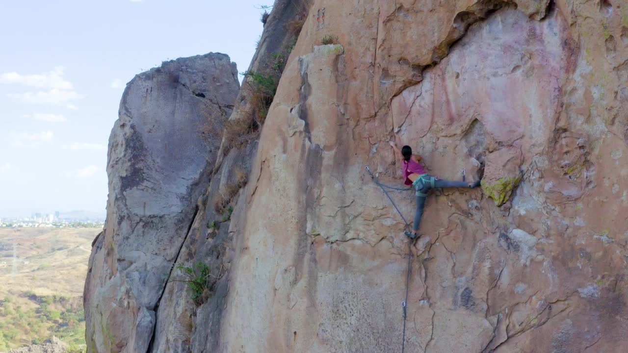 Free Stock Video Young Woman Practicing Extreme Mountaineering On A Mountain Live Wallpaper