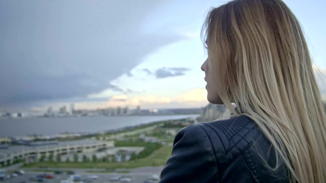 Free Stock Video Young Woman Observing The Horizon From Above Live Wallpaper