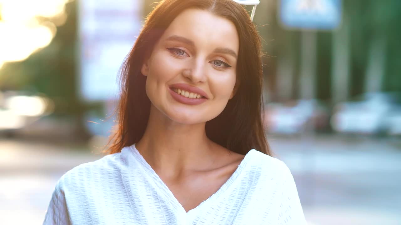 Free Stock Video Young Woman In The Street Smiling At The Camera Live Wallpaper