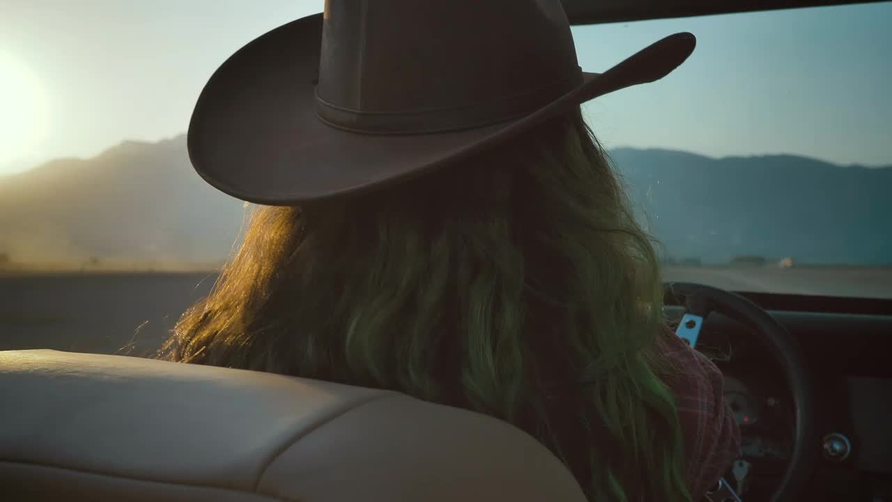 Free Stock Video Young Woman Drives A Jeep Through A Desert Live Wallpaper