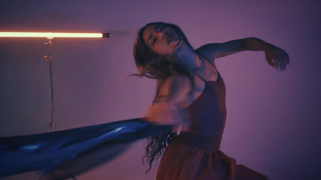 Free Stock Video Young Woman Dancing And Spinning In A Dark Studio Live Wallpaper