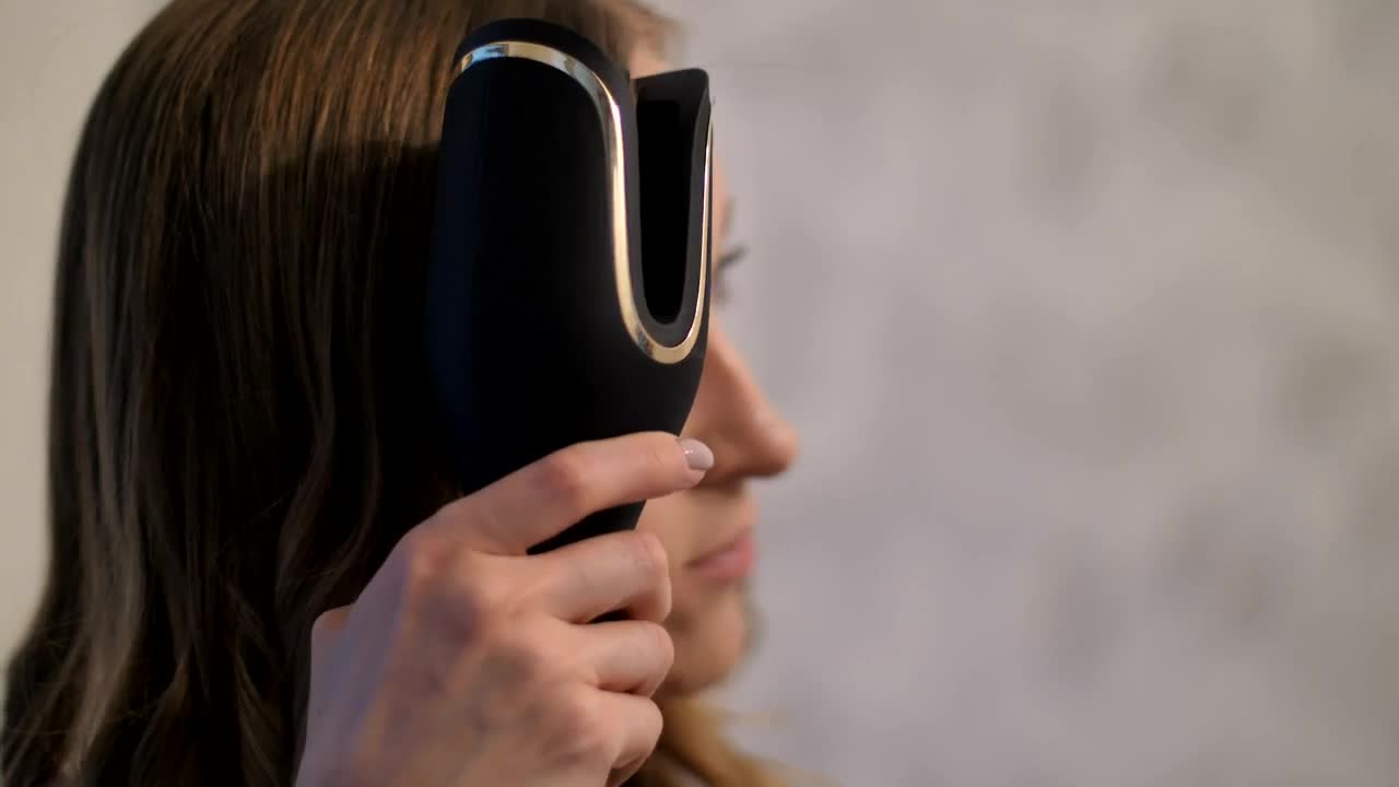 Free Stock Video Young Woman Curling Her Hair Live Wallpaper