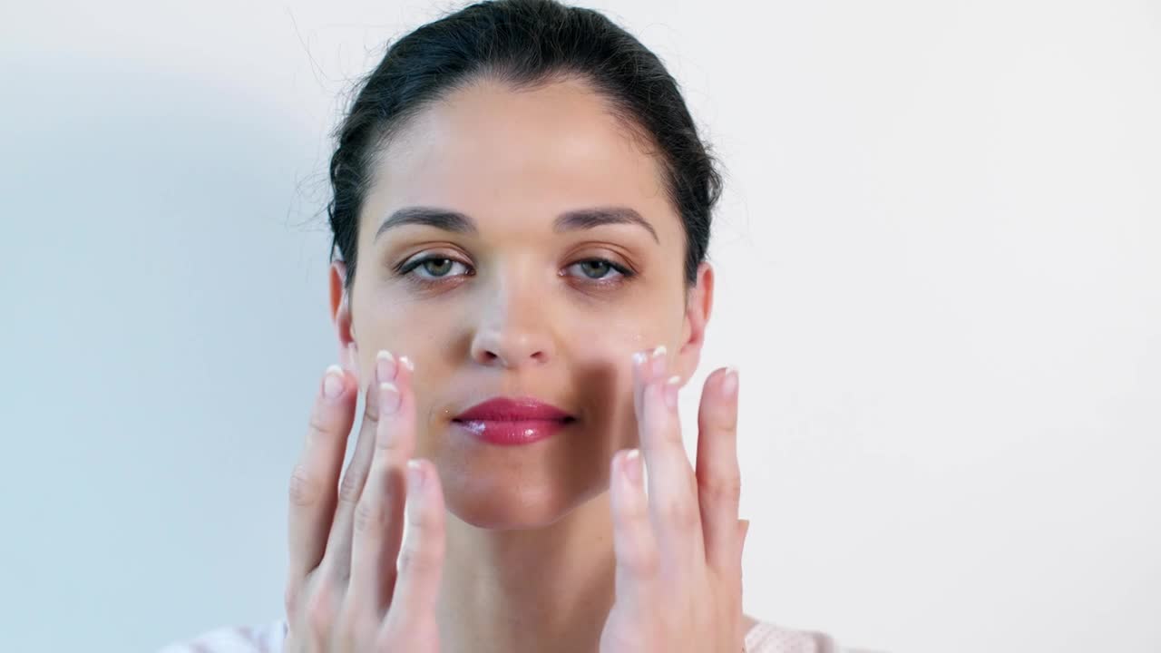 Free Stock Video Young Woman Applying Skin Care Cream On Face Live Wallpaper