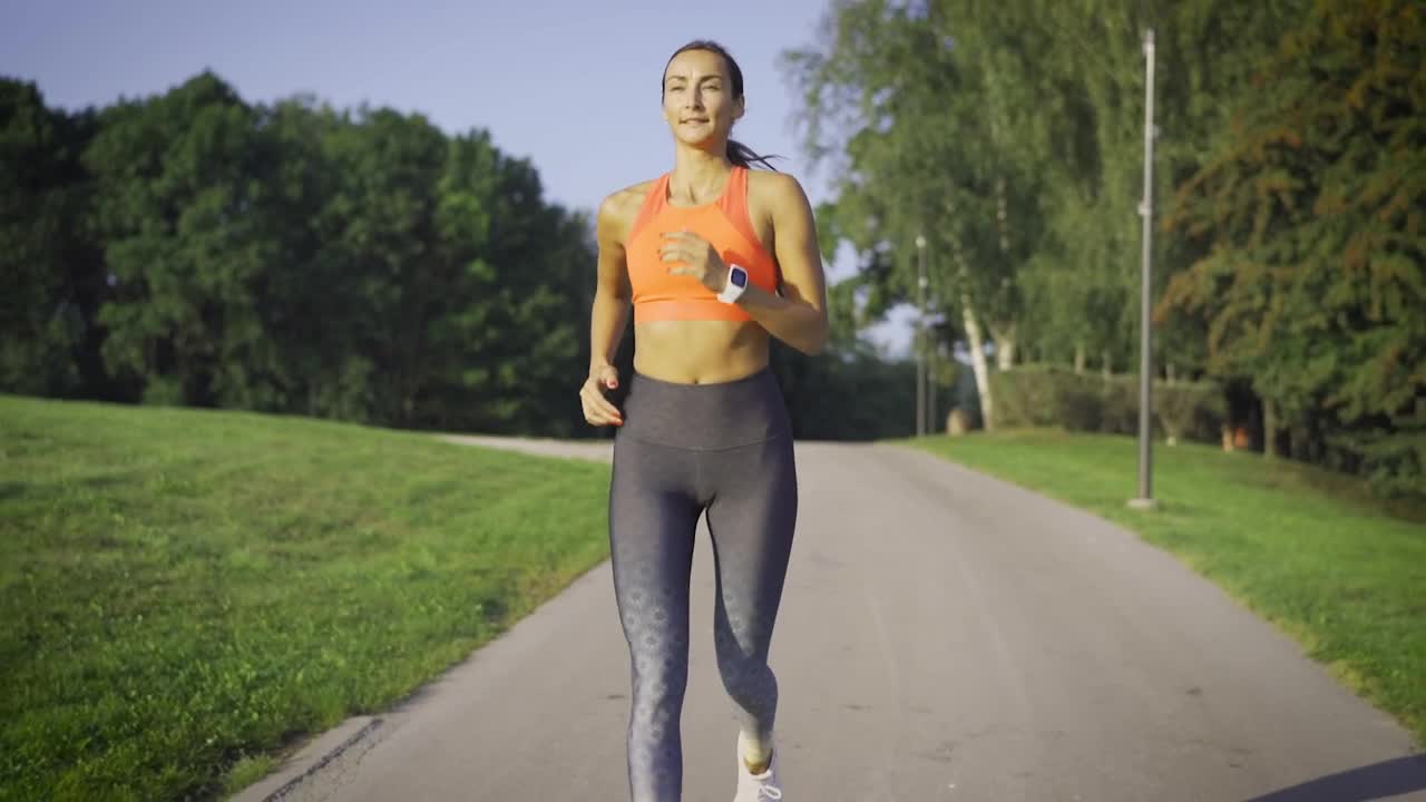 Free Stock Video Young Sporty Woman Running In The Park Live Wallpaper