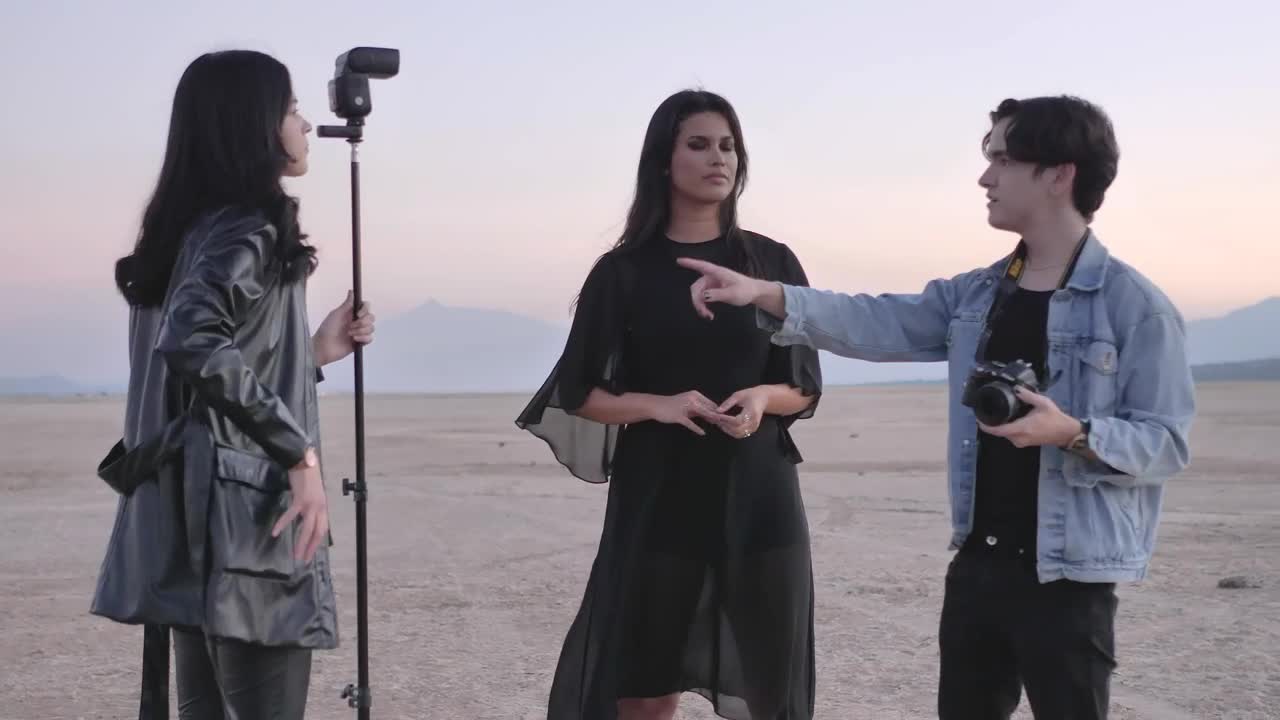 Free Stock Video Young Photographer Giving Directions At A Photoshoot Live Wallpaper