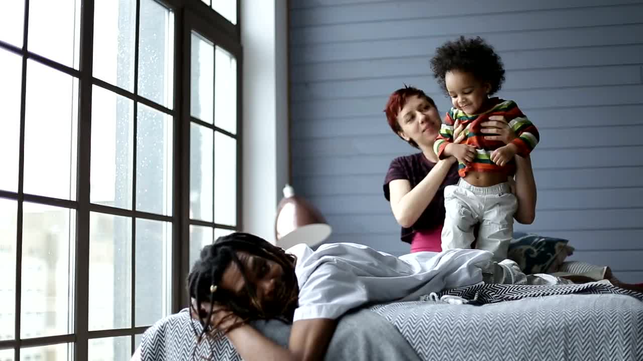 Free Stock Video Young Parents Having Fun With Their Little Son Live Wallpaper