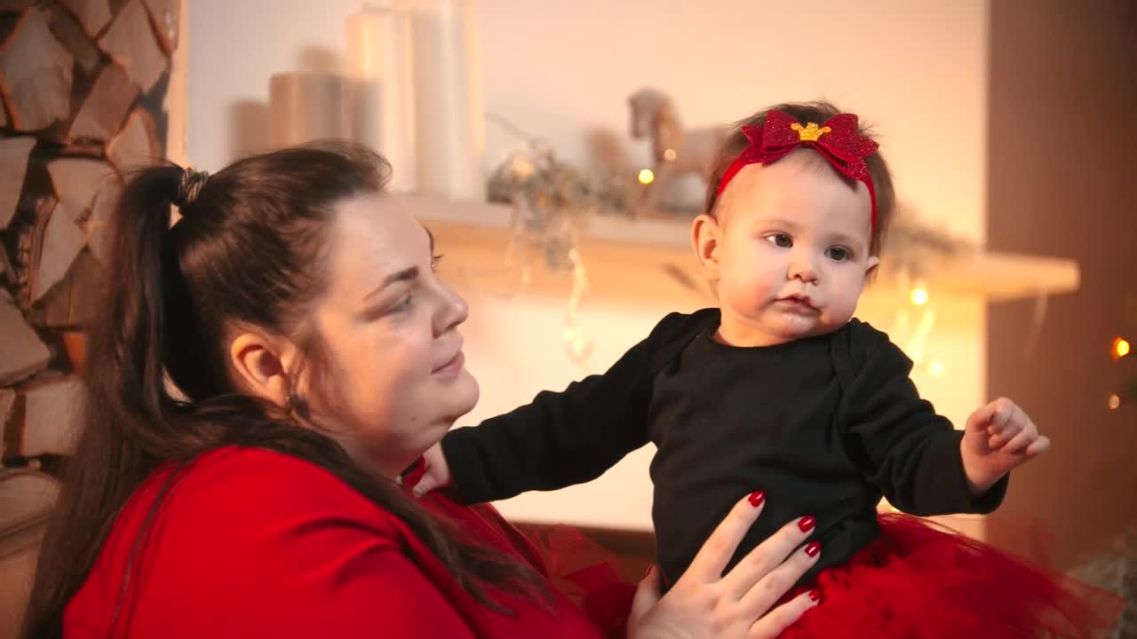 Free Stock Video Young Mother Holding Her Baby And Playing With Her Live Wallpaper