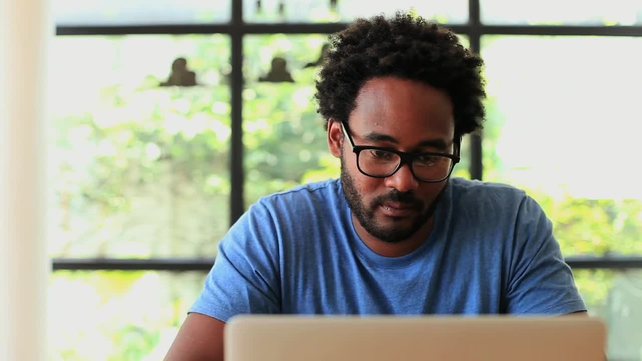 Free Stock Video Young Man Working At Home And Answering A Call Live Wallpaper