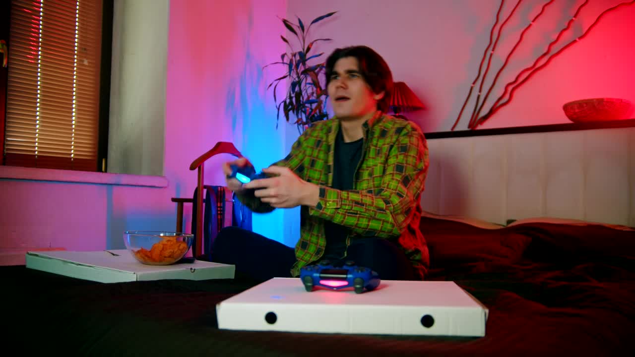 Free Stock Video Young Man Wins In A Video Game And Gets A Live Wallpaper