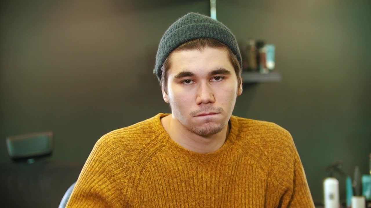 Free Stock Video Young Man Taking Off His Beanie Live Wallpaper