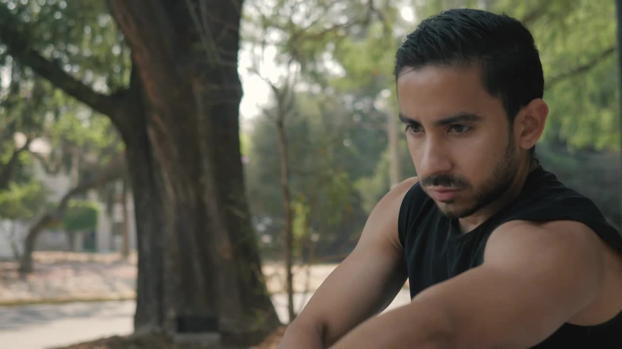 Free Stock Video Young Man Stretching In A Park Before Exercising Live Wallpaper