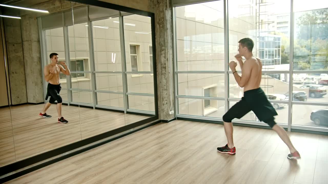 Free Stock Video Young Man Practicing Martial Arts In A Mirror Live Wallpaper