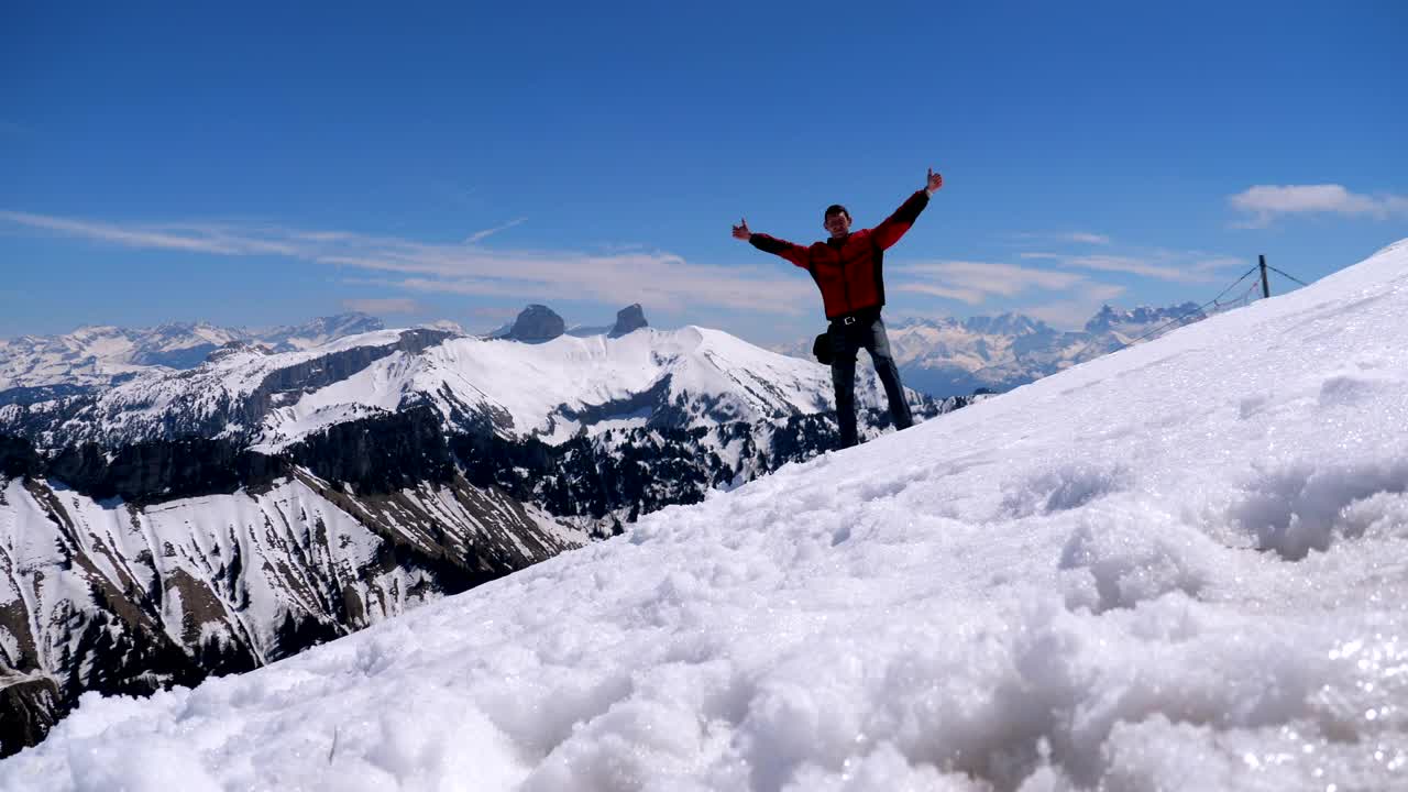 Free Stock Video Young Man On The Top Of A Snowy Mountain Live Wallpaper
