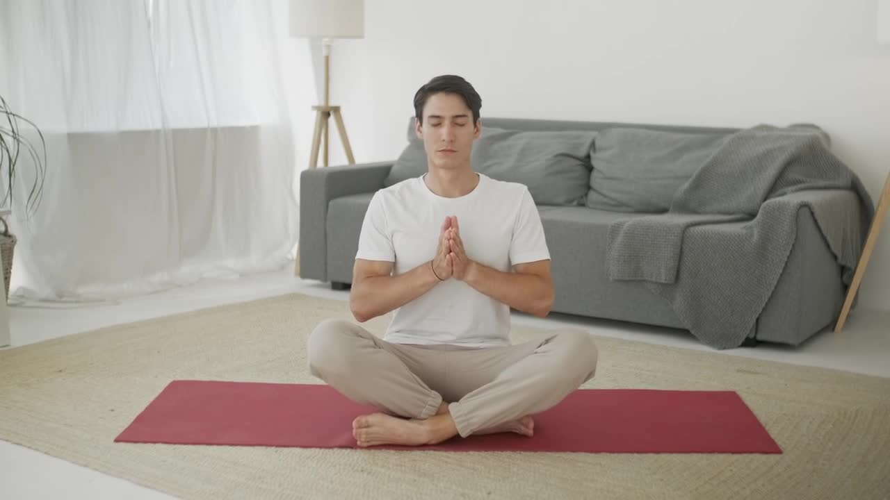 Free Stock Video Young Man Meditating At Home Front View Live Wallpaper