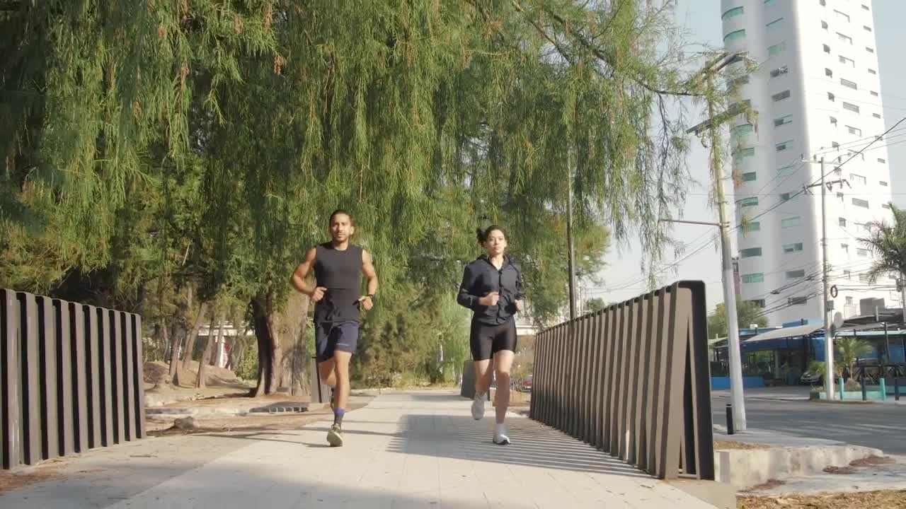 Free Stock Video Young Man And Woman Jogging Outdoors Live Wallpaper