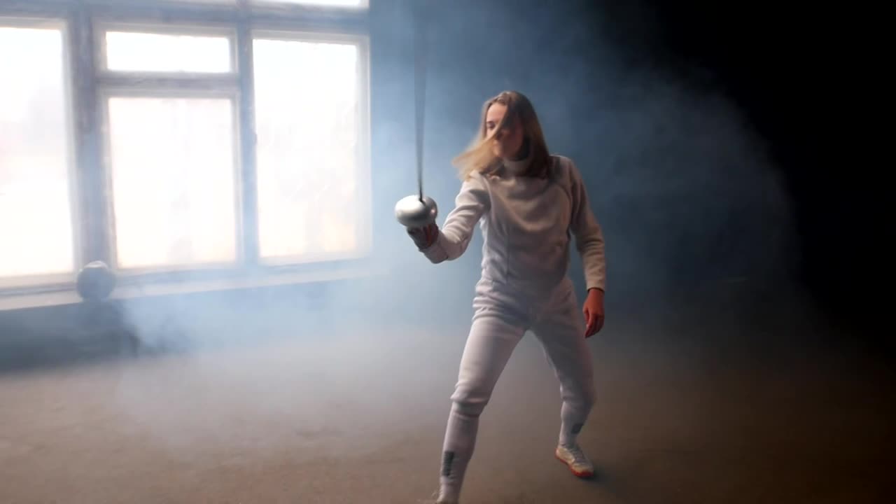 Free Stock Video Young Female Fencer Practicing Basic Movements Live Wallpaper