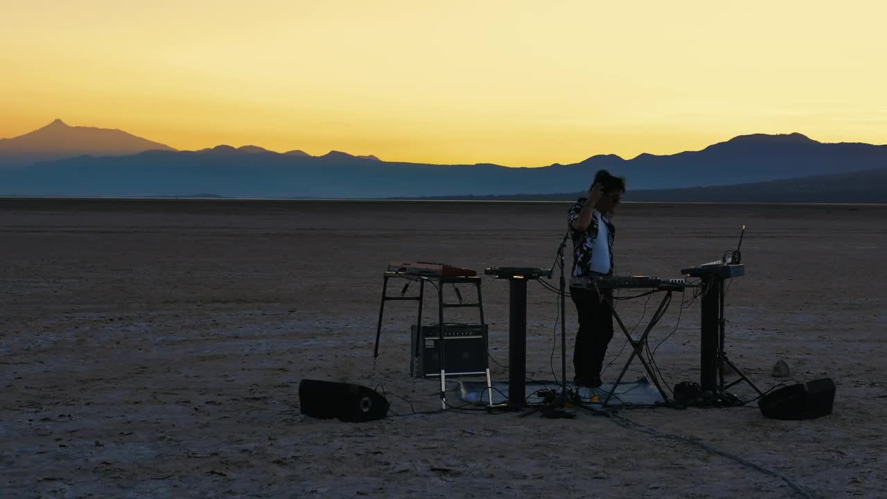 Free Stock Video Young Dj Mixing Music In A Desert Live Wallpaper