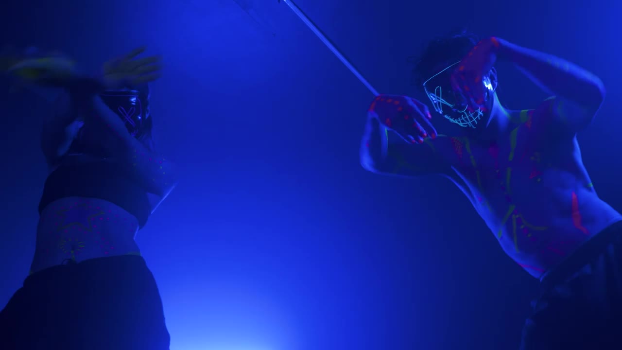 Free Stock Video Young Dancers Doing Dance Steps With Neon Masks Live Wallpaper