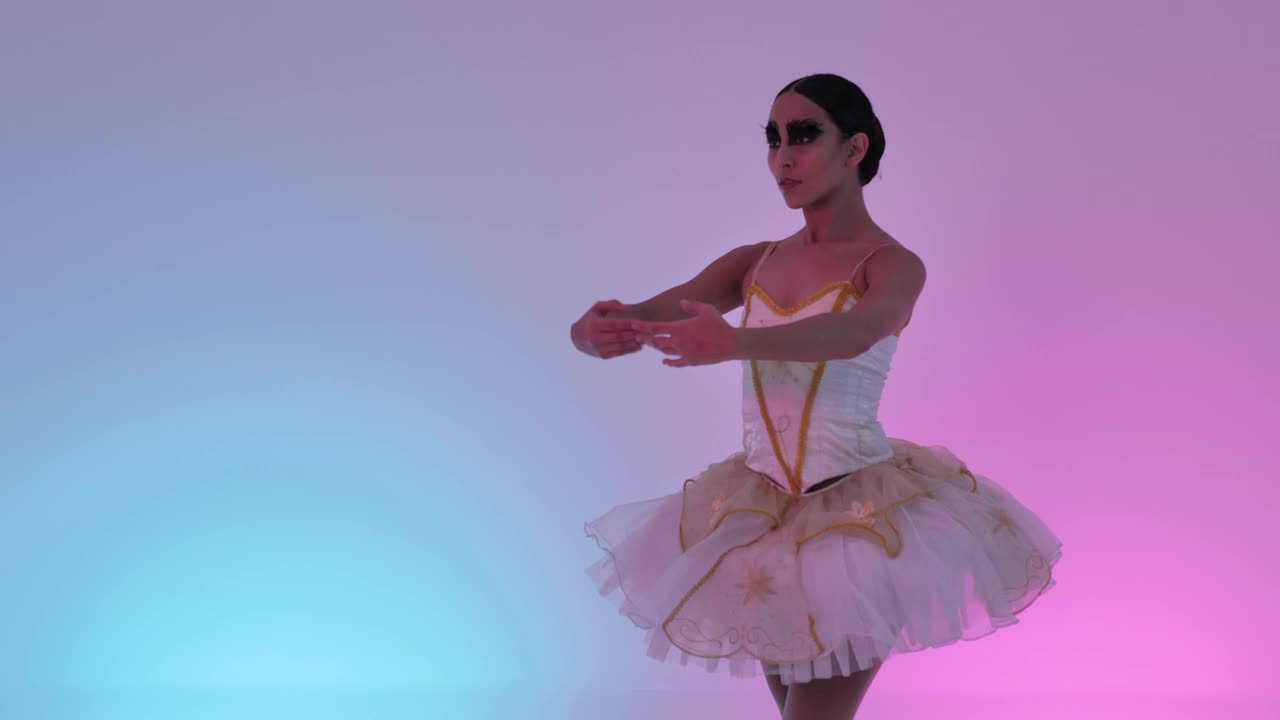 Free Stock Video Young Ballerina Doing Movements On A Colorful Background Live Wallpaper