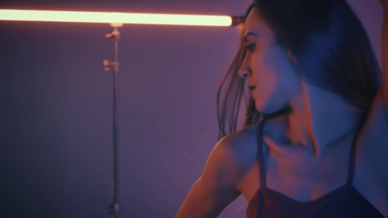 Free Stock Video Young Ballerina Dancing Artistically In A Dark Place Live Wallpaper